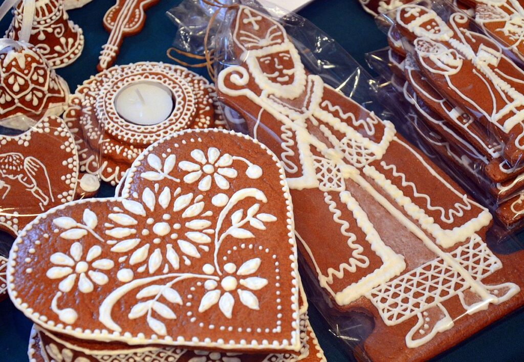 German Lebkuchen decorated with white icing to look like a floral heart and a bishop